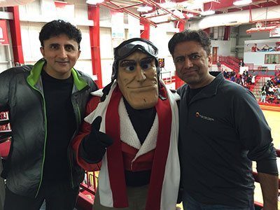 Dr Singh and Dr. Khurana with Lewis University Mascott Bedcheck Charlie