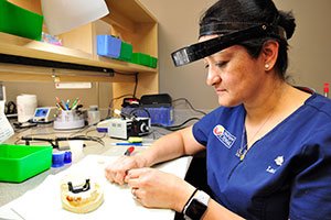 Woman working in Dental Lab