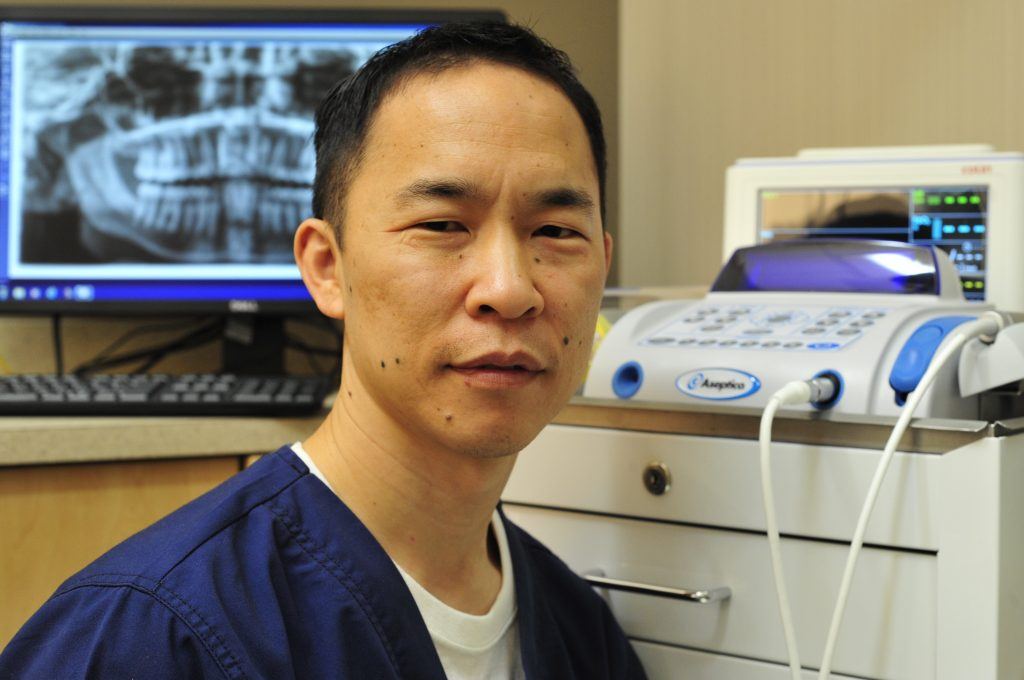 Romeoville, IL oral surgeon Clarence Tang MD